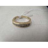 A 9ct gold diamond set eternity ring