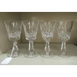 A set of four Waterford crystal Lismore pattern stemmed wine glasses