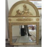 A modern overmantel mirror, set in a cream and gilt frame, decorated with neo-classical motifs