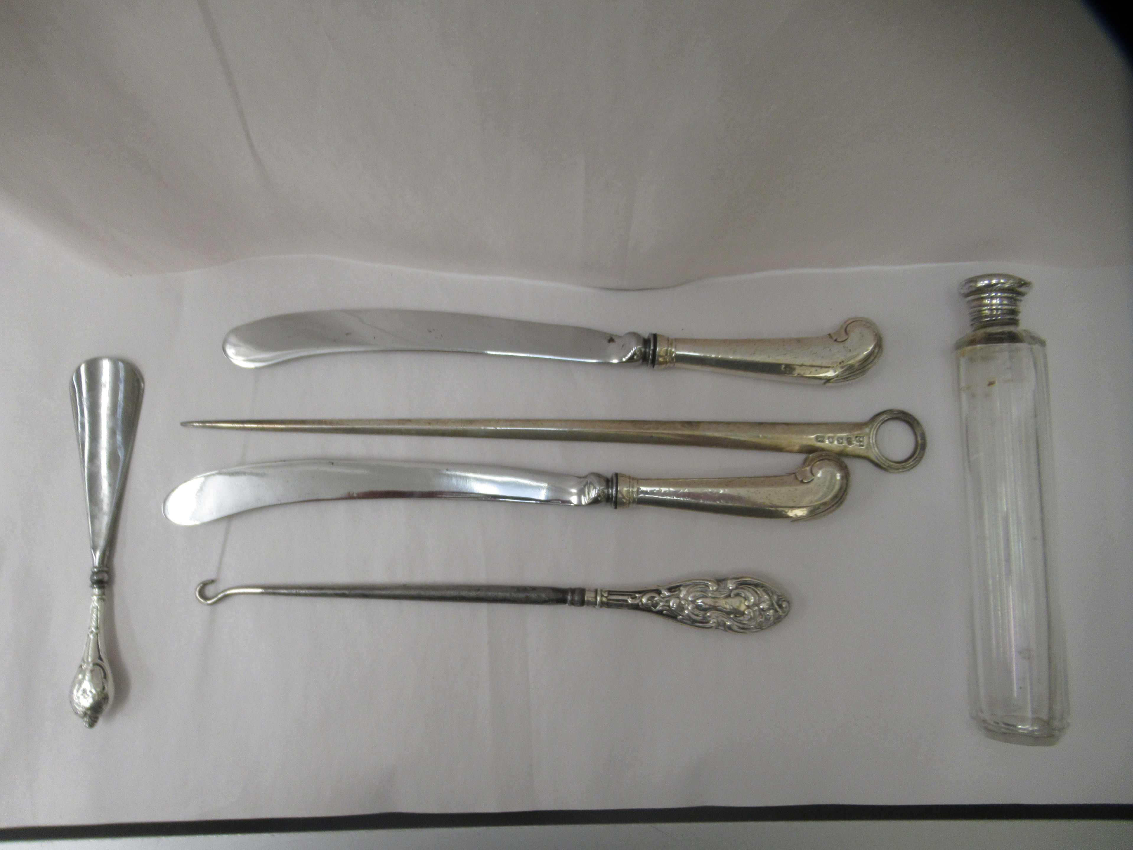 A pair of 19thC silver pistol grip silver table knives;  a 19thC silver skewer with a ring terminal; - Image 2 of 4