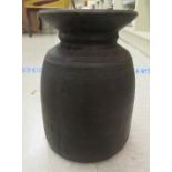 An 'antique' finished turned wooden vase  10"h