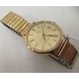 A 1970s Omega Geneve gold plated and steel cased wristwatch, the automatic movement with sweeping