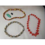 Costume jewellery: to include a blue hardstone set, oval brooch; and a multi-coloured bead necklace,