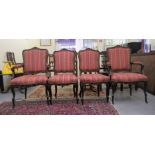 A set of four late 19thC Continental ebonized framed salon chairs, each with fabric upholstered back