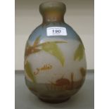 In the manner of Galle - a multi-coloured glass vase of ovoid form, decorated with dragonflies