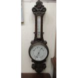 An early 20thC oak cased J Taylor of Nottingham barometer  35"h
