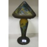 In the manner of Galle - a mushroom design two part etched and coloured glass table lamp,