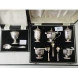 Silver collectables: to include a five piece condiments set  comprising two salts, two pepper pots