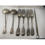 Silver flatware, viz. four forks; two sauce ladles; and a meat skewer  mixed marks