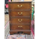 A modern mahogany finished two drawer filing cabinet, raised on bracket feet  31"h  20"w