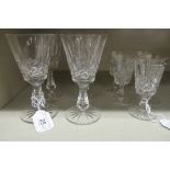 A set of four Waterford crystal Kenmore pattern pedestal wines and five sherries