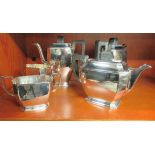 A five piece Mappin & Webb Art Deco inspired silver plated tea set  comprising a teapot, coffee pot,