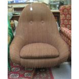 A 1970s Greaves & Thomas fabric button upholstered tub chair, raised on teak effect crossover back