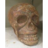 A cast iron model, a human skull  6"h