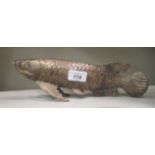 A cast and patinated metal model carp  11"L