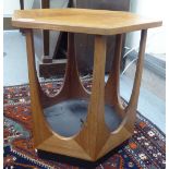 A 1960s G-Plan teak hexagonal two tier occasional table, designed by V P Wilkins,