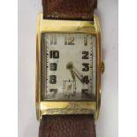 An Art Deco 9ct gold cased wristwatch, the 15 jewel movement faced by an Arabic dial,