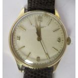 A 1961 Longines 9ct gold cased wristwatch, the movement with sweeping seconds, faced by an Arabic