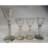 Four 18thC design wine glasses, viz. a pair, each with a double ogee shaped bowl, on a bubbled, open