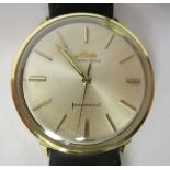 A 1960s Mido Ocean Stan Auto Powerwind yellow metal cased wristwatch, the movement with sweeping