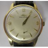 A 1950s Movado 9ct gold cased wristwatch, faced by an Arabic and baton dial, incorporating