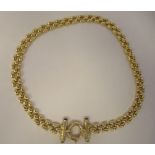 A Collette 14ct gold wide, flexible link necklace, on a ring-bolt clasp