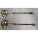 Two similar late 18thC silver punch ladles with pouring lips, on ring turned hardwood handles  marks