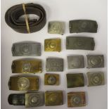 Sixteen various Great War and Third Reich era German brass, steel and alloy military belt buckles;