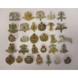 Approx. thirty British military cap badges, some copies: to include 19th Alexandra PWO Hussars,
