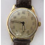 A 1940s Cyma De Luxe Watersport 9ct gold cased wristwatch, the movement converted to a quartz, faced