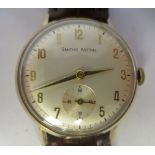 A 1960s Smiths Astral 9ct gold cased wristwatch, faced by an Arabic dial, incorporating subsidiary