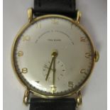 A Paul Buhre, Goldsmiths & Silversmiths 9ct gold cased wristwatch, faced by an Arabic dial,