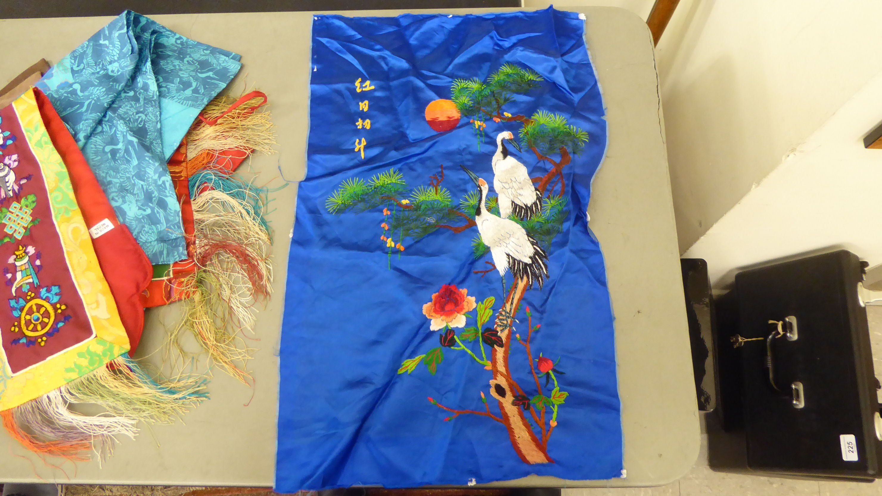 20thC Chinese textiles: to include a fabric hanging panel, decorated with a blue dragon  10" x 21" - Image 2 of 6