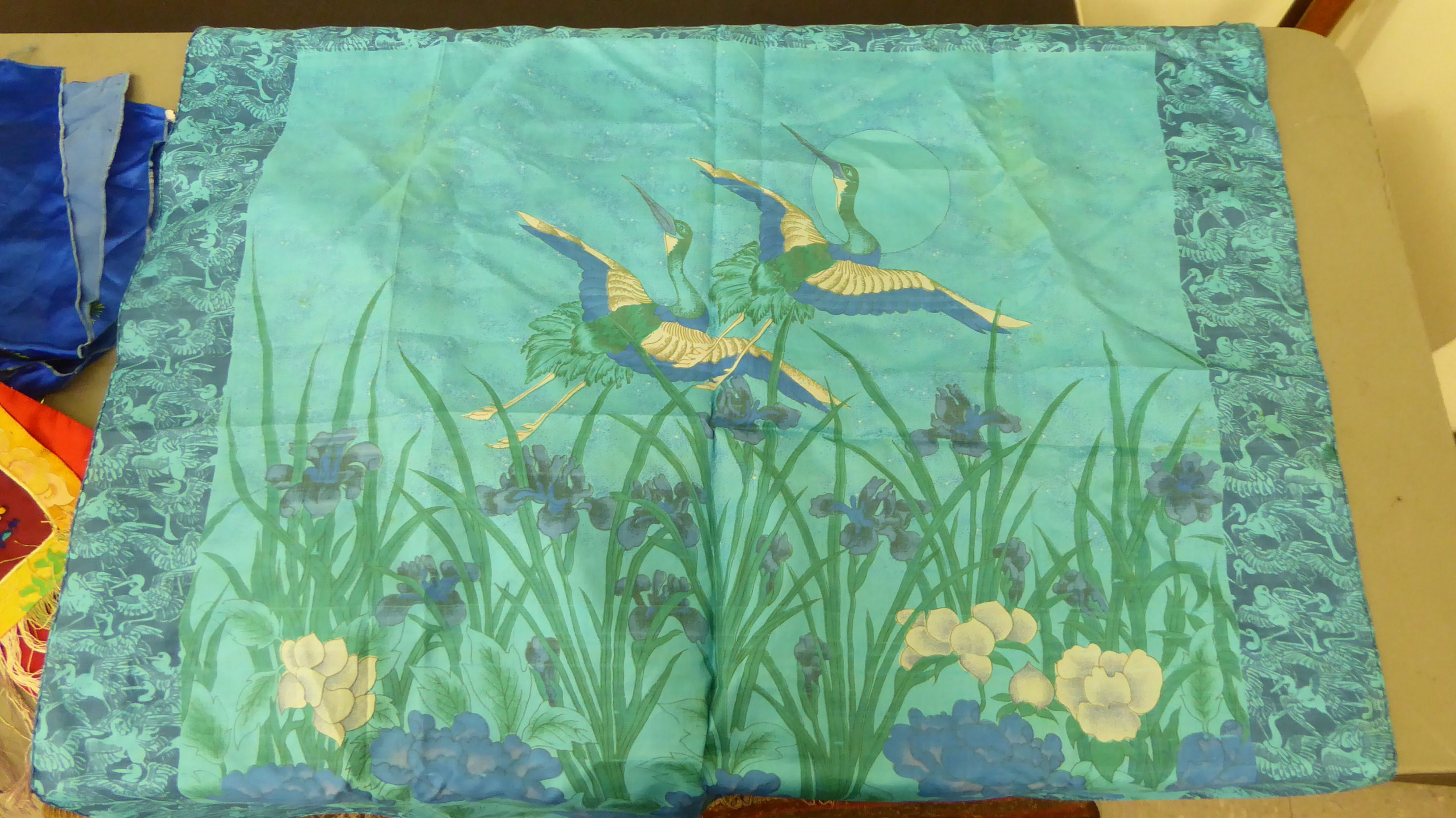 20thC Chinese textiles: to include a fabric hanging panel, decorated with a blue dragon  10" x 21" - Image 3 of 6