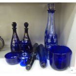 Glassware: to include a pair of Georgian style blue decanters and stoppers, inscribed 'Rum' and '