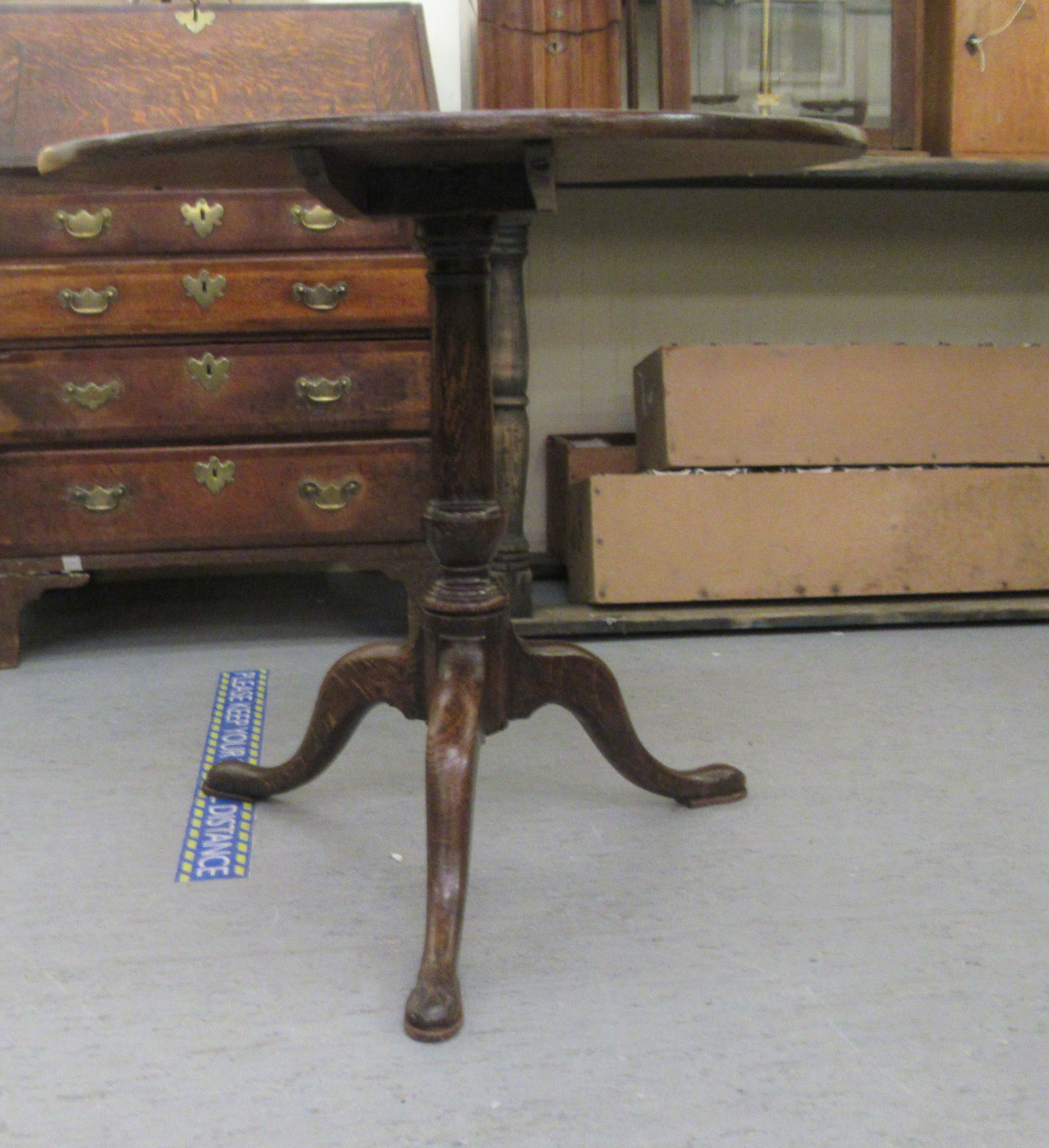 A George III and later oak pedestal table, raised on a cabriole tripod base  28"h  29"dia - Image 2 of 4