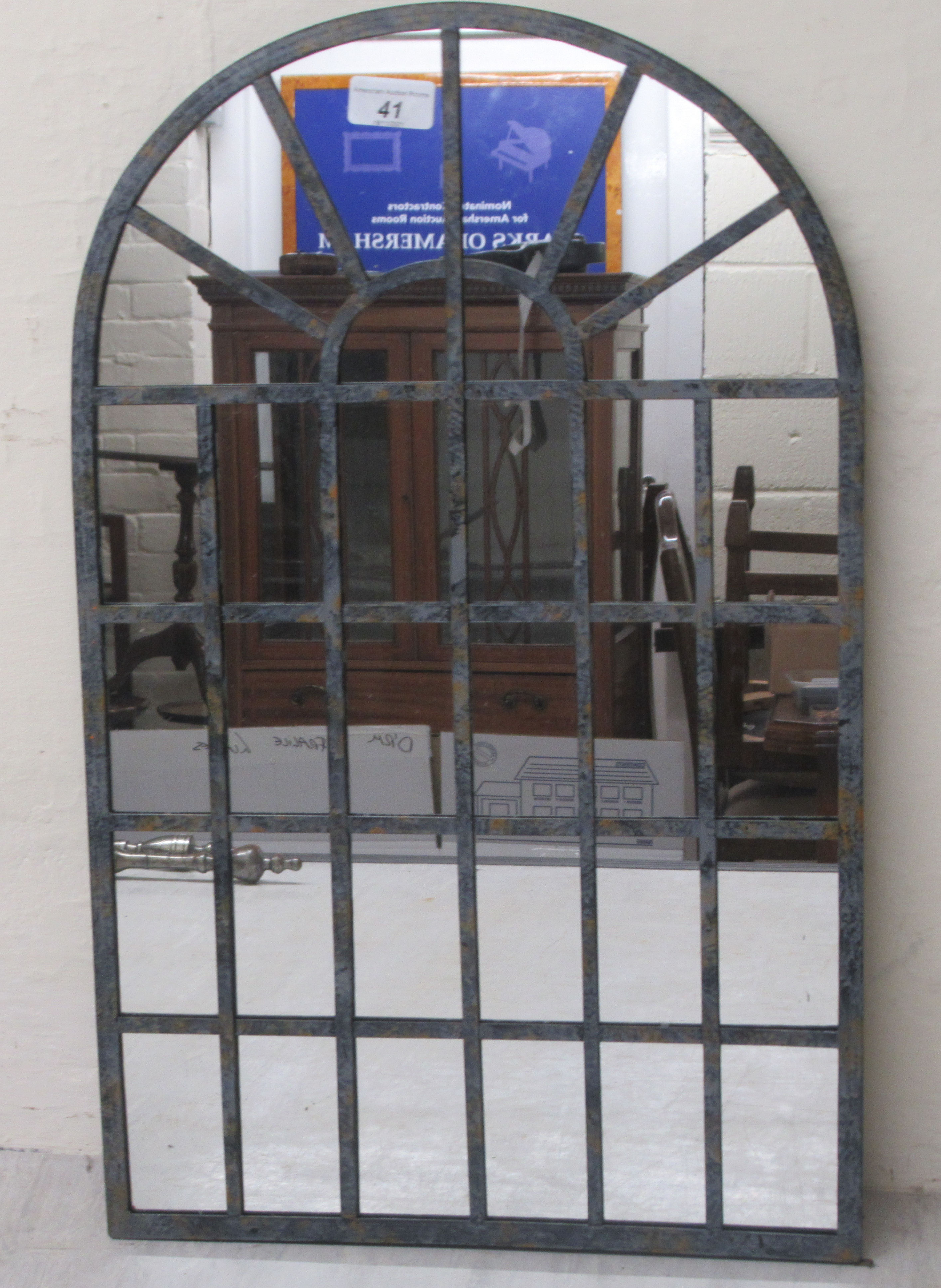 A galvanised metal framed mirror  23" x 14"