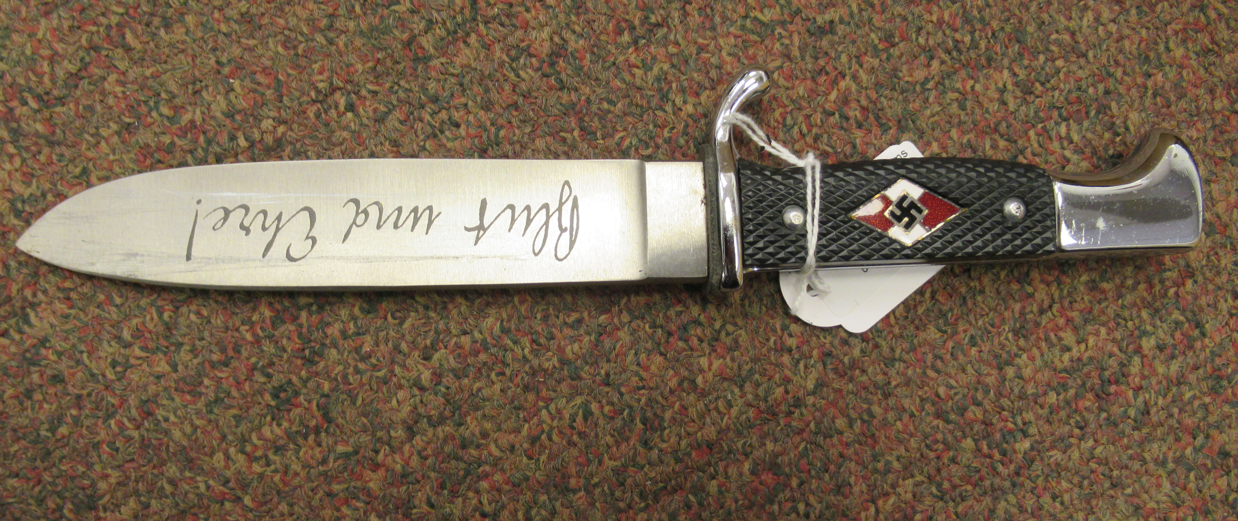 A Hitler Youth dagger, the rivetted grip plate incorporating a red, white and black enamelled - Image 3 of 6