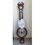 A Regency satinwood inlaid mahogany barometer with a silvered dial, inscribed F Belloni, Shaftesbury