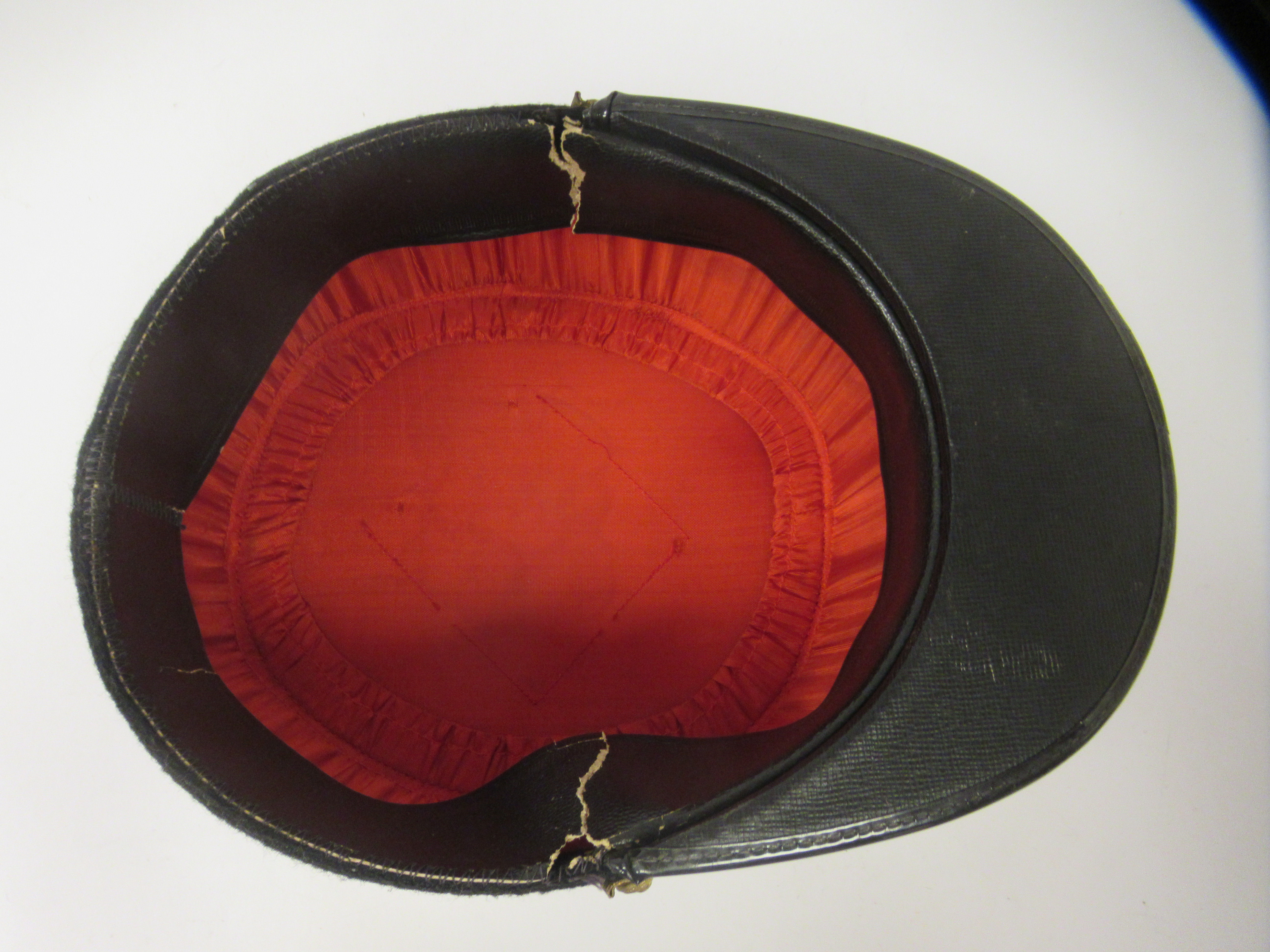 A vintage French Gendarme's black and red, peaked kepi - Image 5 of 5