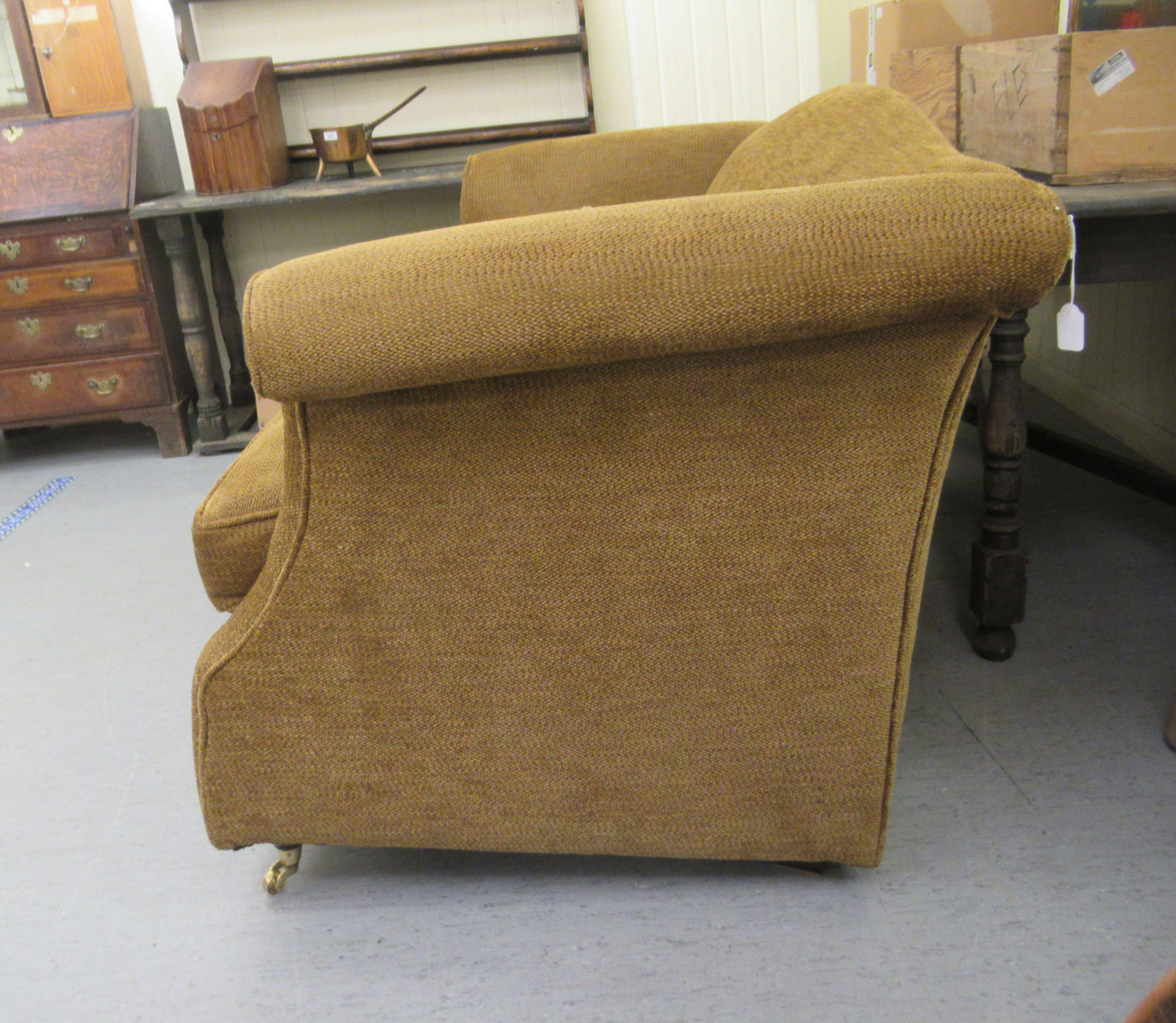 A modern textured fabric upholstered two person settee with an arched back and level arms, raised on - Image 2 of 2