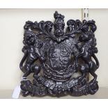 A cast iron plaque, bearing a coat of arms  12" x 11"