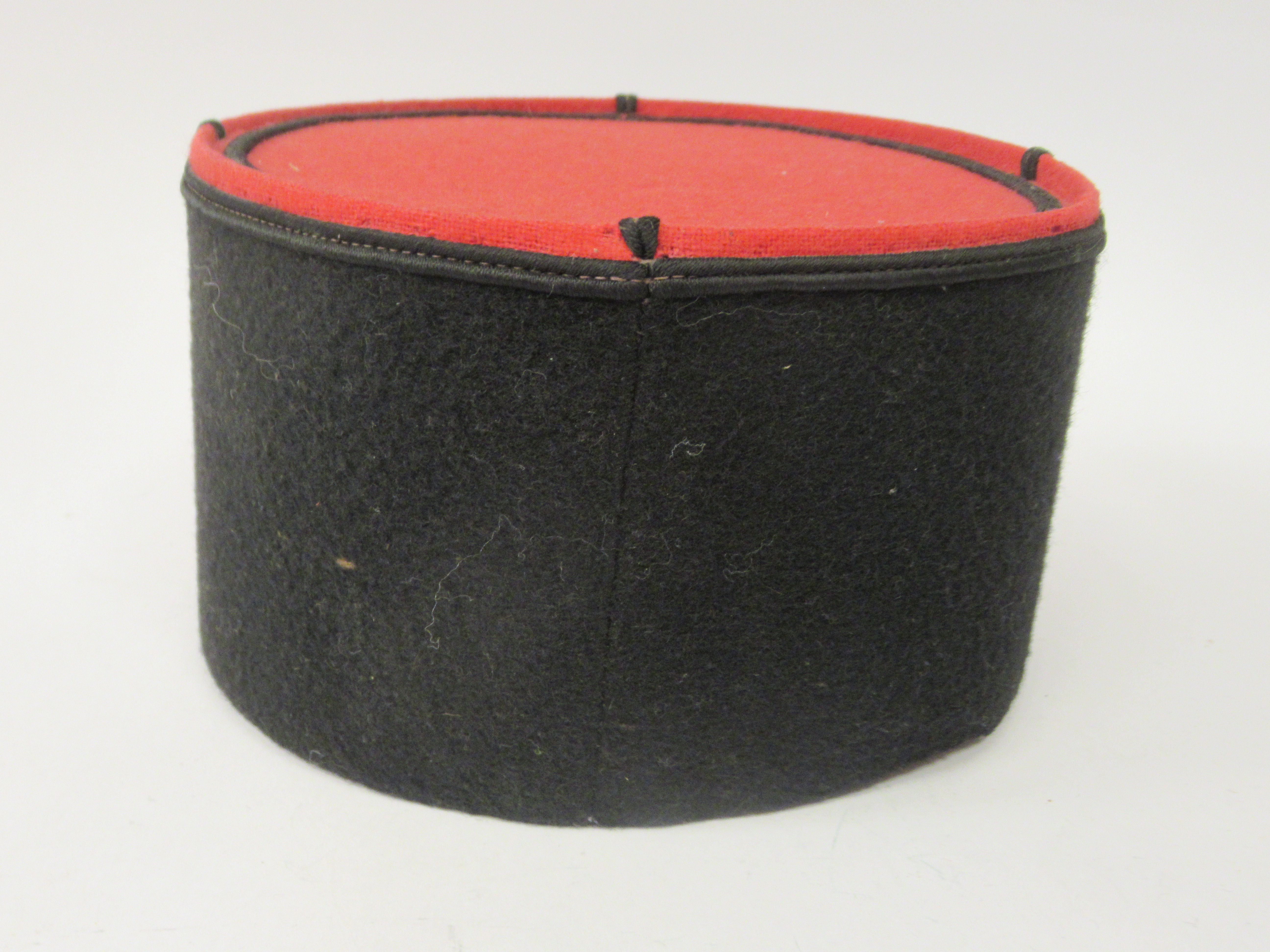 A vintage French Gendarme's black and red, peaked kepi - Image 2 of 5