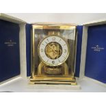 A Jaeger LeCoultre Atmos clock, Classic V model  9"h  6"w with paperwork, in original box