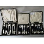 Three cased sets of six silver coffee spoons  mixed marks