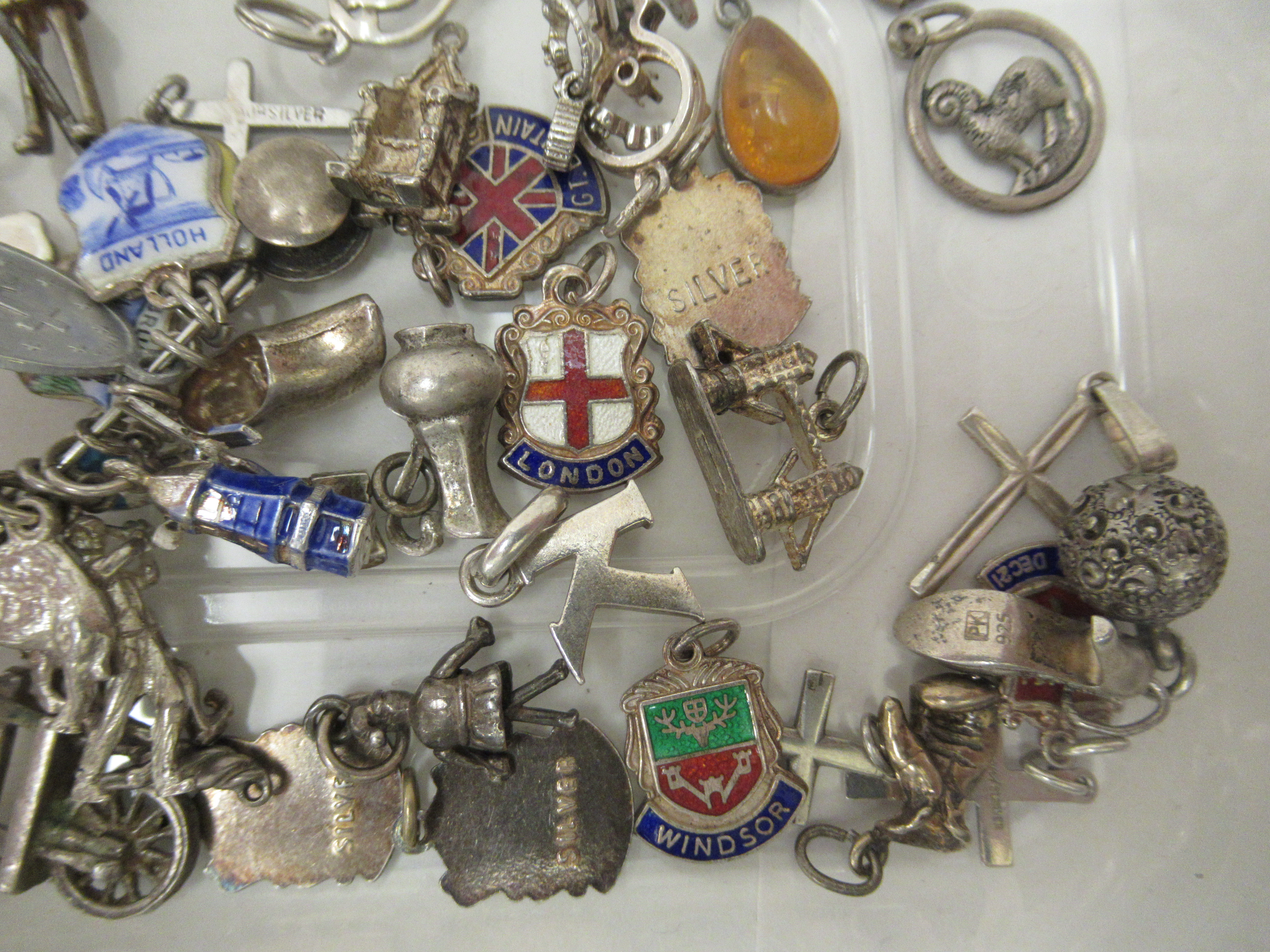 Silver and white metal bracelet charms: to include a camel, a shoe and a crucifix - Image 3 of 4