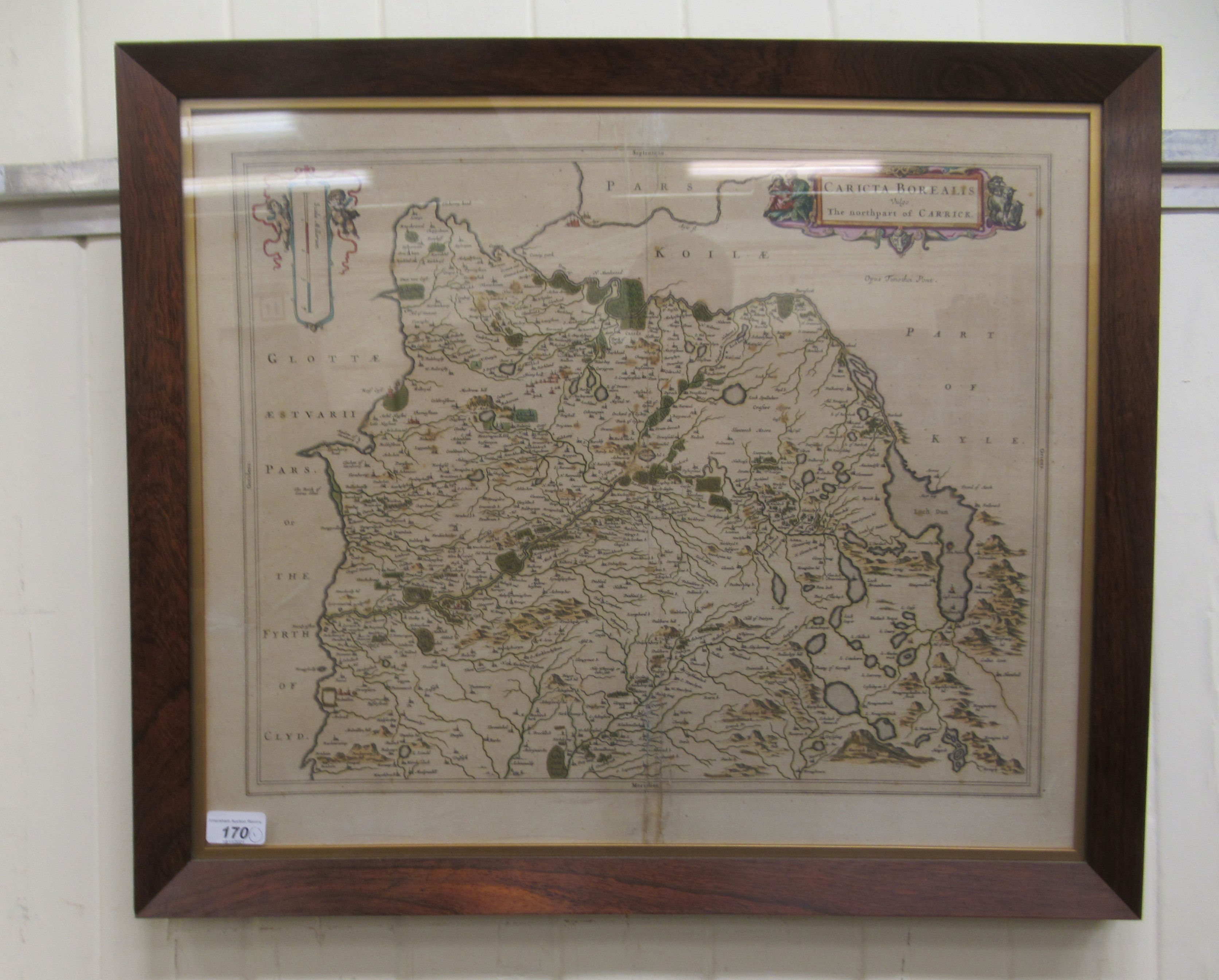 An 18thC coloured map 'Cartica Borealis' the Northern part of Carrick  bears a cherubic themed scale