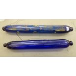 Two Victorian blue glass rolling pins with painted decoration  30"L