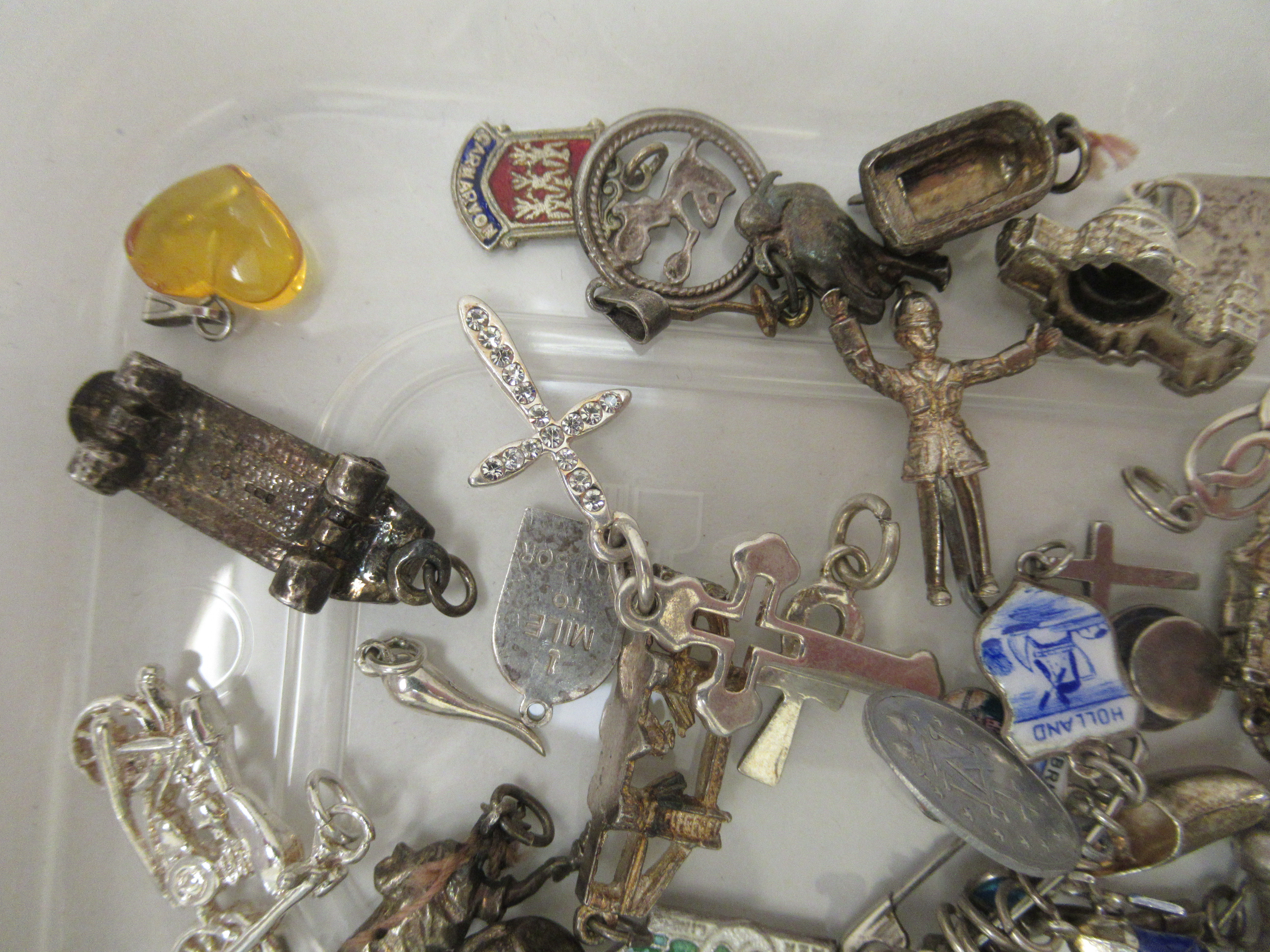 Silver and white metal bracelet charms: to include a camel, a shoe and a crucifix - Image 2 of 4