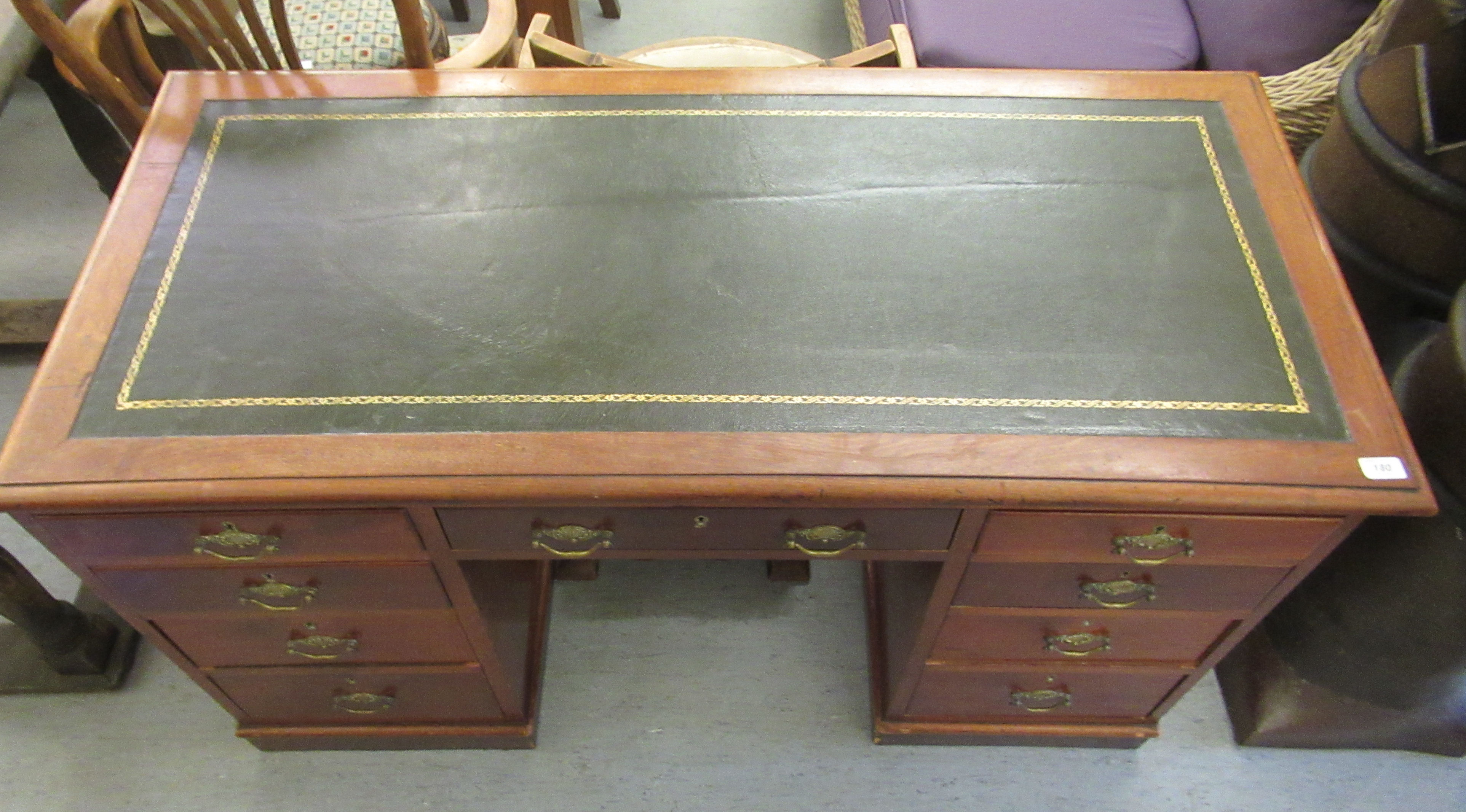 An Edwardian mahogany nine drawer, twin pedestal plinth, the top set with a tooled green hide - Image 2 of 3